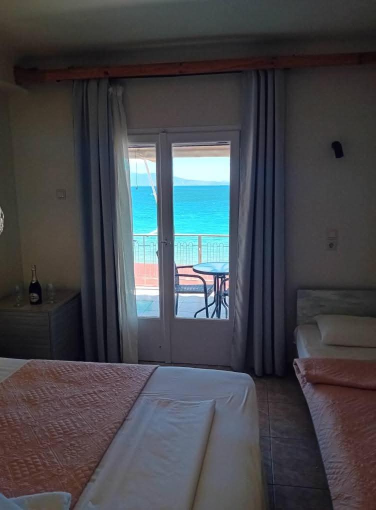 Hotel Assini Beach Tolón Exterior foto